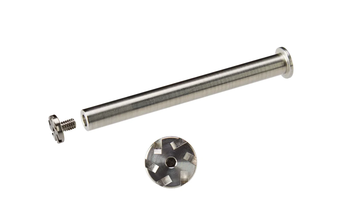 Exploded NDZ guide rod assembly: hex-screw cap, washer, machined rod body, and spring seat.